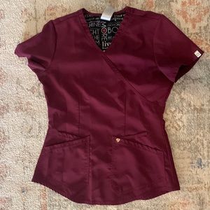 Careisma scrub top. Size small.